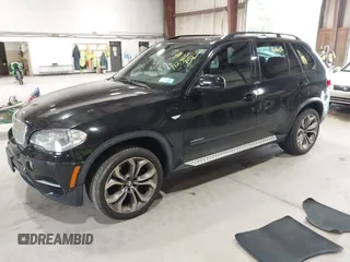 2012 BMW X5 50i with VIN 5UXZV8C50CL425721, listed as a IAAI auction lot 42590676 with 192,355 mi miles and . Bid and sale history available at DreamBid. Image 17.