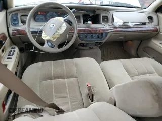 2004 Mercury Grand Marquis GS with VIN 2MEFM74W44X659873, listed as a Copart auction lot 51793205 with 115,384 mi miles and Salvage Title. Bid and sale history available at DreamBid. Image 8.