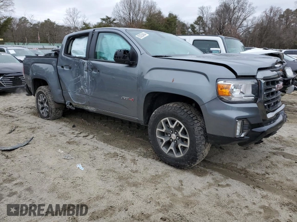 2022 GMC Canyon 4WD AT4 z VIN 1GTG6FENXN1274389, wystawiony jako Copart lot #85255404 z przebiegiem 42 843 mil mil oraz Szkoda całkowita • Salvage title. Historia ofert i sprzedaży dostępna na DreamBid. Obrazek 4.