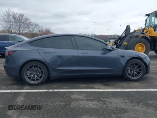 2022 Tesla Model 3 Long Range with VIN 5YJ3E1EB9NF206943, listed as a IAAI auction lot 41911040 with 69,920 mi miles and . Bid and sale history available at DreamBid. Image 13.