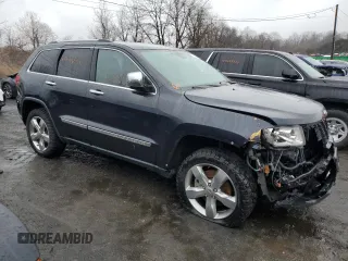 2013 Jeep Grand Cherokee Overland with VIN 1C4RJFCT6DC586933, listed as a Copart auction lot 45499294 with 80,249 mi miles and Salvage Title. Bid and sale history available at carsss.com. Image 4.