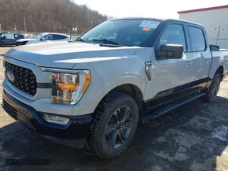 2023 Ford F-150 XL with VIN 1FTFW1E57PKE92608, listed as a IAAI auction lot 41679838 with 21,349 mi miles. Bid and sale history available at carsss.com. Image 2.