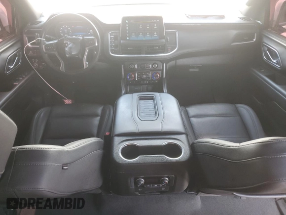 2023 Chevrolet Suburban with VIN 1GNSKDKL5PR286474, listed as a Copart auction lot 55678915 with 96,049 mi miles and Salvage title. Bid and sale history available at DreamBid. Image 8.