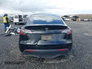 2022 Tesla Model Y Long Range z VIN 7SAYGDEE4NF447985, wystawiony jako IAAI lot #41811782 z przebiegiem 81 973 mil mil oraz . Historia ofert i sprzedaży dostępna na DreamBid. Obrazek 15.