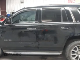 2015 Chevrolet Tahoe LT z VIN 1GNSCBKC1FR228488, wystawiony jako IAAI lot #41933869 z przebiegiem 164 523 mil mil oraz . Historia ofert i sprzedaży dostępna na DreamBid. Obrazek 15.