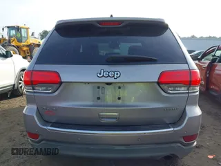 2016 Jeep Grand Cherokee Limited 75th Anniversary with VIN 1C4RJFBG5GC401277, listed as a IAAI auction lot 41119644 with 156,658 mi miles and . Bid and sale history available at DreamBid. Image 17.
