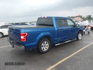 2018 Ford F-150 XL with VIN 1FTEW1CB2JFC79764, listed as a IAAI auction lot 42378319 with 69,571 mi miles and . Bid and sale history available at DreamBid. Image 4.