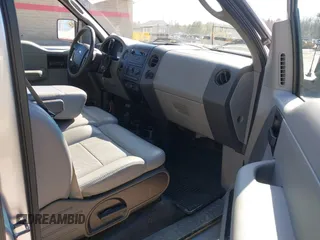 2005 Ford F-150 STX with VIN 1FTRX14W75FB45211, listed as a IAAI auction lot 41998529 with 325,970 mi miles. Bid and sale history available at carsss.com. Image 5.