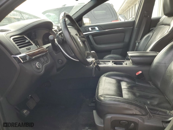 2010 Lincoln MKS with VIN 1LNHL9DRXAG606529, listed as a Copart auction lot 85642534 with 203,565 mi miles and Salvage Title. Bid and sale history available at carsss.com. Image 7.