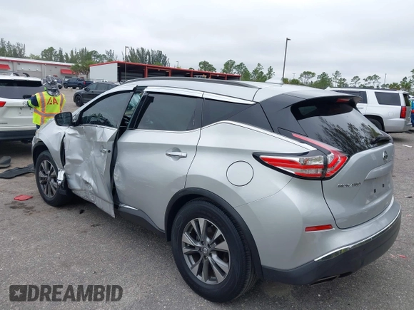 2018 Nissan Murano SV with VIN 5N1AZ2MGXJN138318, listed as a IAAI auction lot 41332561 with 104,067 mi miles and . Bid and sale history available at DreamBid. Image 3.
