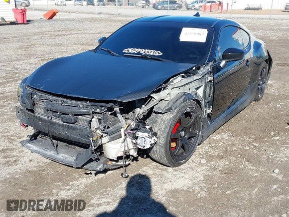 2014 Scion FR-S z VIN JF1ZNAA14E9708590, wystawiony jako IAAI lot #41278089 z przebiegiem 117 357 mil mil oraz . Historia ofert i sprzedaży dostępna na DreamBid. Obrazek 6.