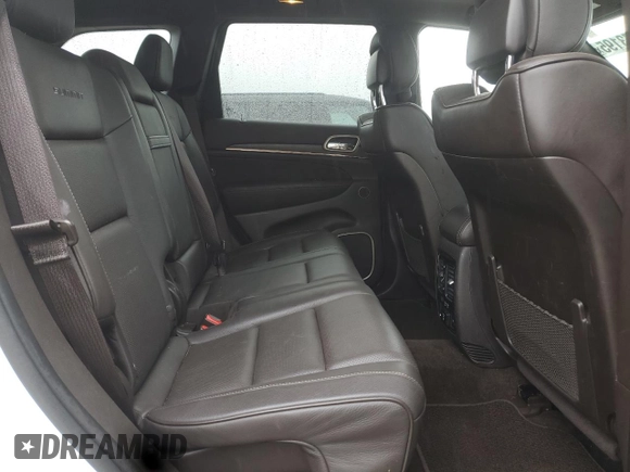 2015 Jeep Grand Cherokee Summit с VIN 1C4RJFJT6FC819747, выставлен на аукционе Copart как лот 58973195 с пробегом 191 252 миль миль и Чистый • Clean title. История ставок и продаж доступна на DreamBid. Изображение 10.