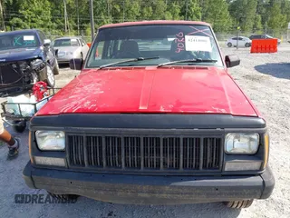 1996 Jeep Cherokee z VIN 1J4FB28S4TL145447, wystawiony jako IAAI lot #42414080 z przebiegiem 437 448 mil mil oraz . Historia ofert i sprzedaży dostępna na DreamBid. Obrazek 6.