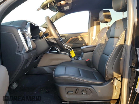 2023 GMC Canyon 4WD Denali with VIN 1GTP6FEK8P1164692, listed as a Copart auction lot 77033234 with 5,644 mi miles and Salvage Title. Bid and sale history available at carsss.com. Image 7.