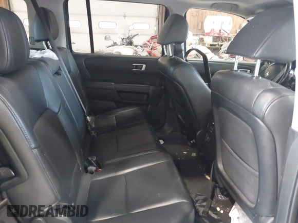 2013 Honda Pilot EX-L with VIN 5FNYF4H59DB065915, listed as a IAAI auction lot 42063074 with 118,894 mi miles. Bid and sale history available at carsss.com. Image 8.