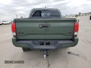 2021 Toyota Tacoma SR z VIN 3TYCZ5AN3MT046066, wystawiony jako Copart lot #54785665 z przebiegiem 57 897 mil mil oraz Szkoda całkowita • Salvage title. Historia ofert i sprzedaży dostępna na DreamBid. Obrazek 6.