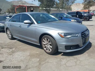 2016 Audi A6 3.0T Premium Plus with VIN WAUFGAFC4GN159496, listed as a IAAI auction lot 41885413 with 94,243 mi miles. Bid and sale history available at carsss.com. Image 1.