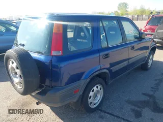 1999 Honda CR-V LX with VIN JHLRD1846XC028583, listed as a IAAI auction lot 42154092 with 200,228 mi miles. Bid and sale history available at carsss.com. Image 4.