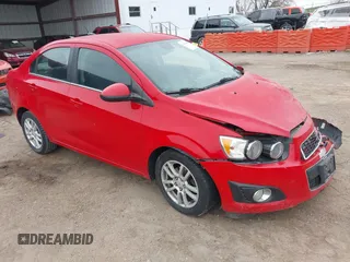 2012 Chevrolet Sonic LT with VIN 1G1JC5SH7C4133484, listed as a IAAI auction lot 42076809 with 100,506 mi miles and . Bid and sale history available at DreamBid. Image 1.