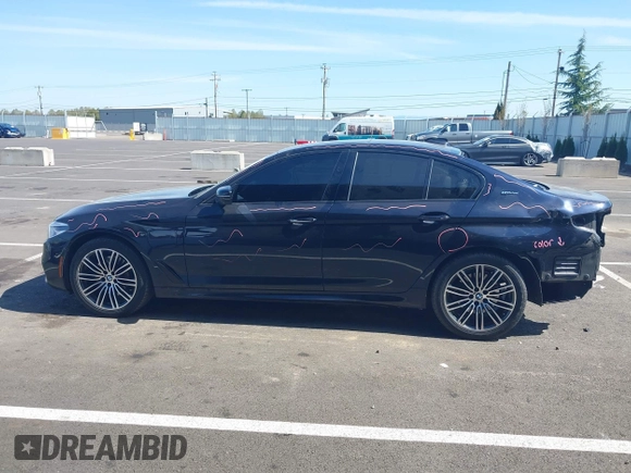 2018 BMW 5 Series 530e xDrive with VIN WBAJB1C51JB374308, listed as a IAAI auction lot 41965038 with 122,791 mi miles and . Bid and sale history available at carsss.com. Image 15.