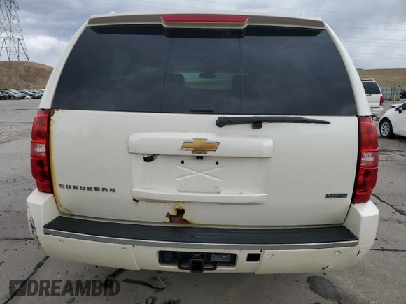 2010 Chevrolet Suburban LTZ with VIN 1GNUKKE35AR292291, listed as a Copart auction lot 49627085 with 233,359 mi miles and Salvage Title. Bid and sale history available at carsss.com. Image 6.