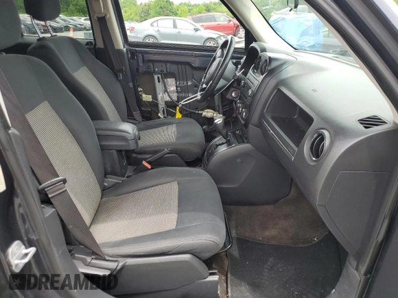 2014 Jeep Patriot Latitude with VIN 1C4NJRFB2ED718259, listed as a Copart auction lot 58095825 with 116,665 mi miles and Salvage title. Bid and sale history available at DreamBid. Image 7.