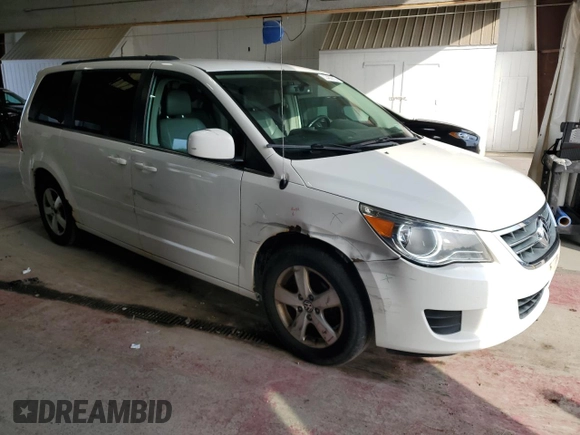 2011 Volkswagen Routan SE with VIN 2V4RW3DG7BR717718, listed as a Copart auction lot 63480915 with 271,938 mi miles and Salvage title. Bid and sale history available at DreamBid. Image 4.