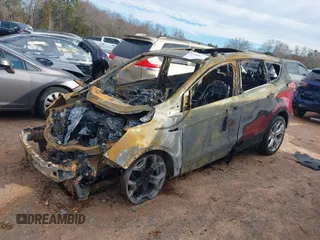 2019 Ford Escape Titanium z VIN 1FMCU9J99KUA72809, wystawiony jako IAAI lot #41588522 z przebiegiem Nie podano mil oraz . Historia ofert i sprzedaży dostępna na DreamBid. Obrazek 2.