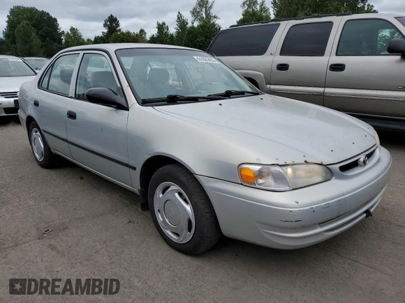 1999 Toyota Corolla VE with VIN 1NXBR12E3XZ153645, listed as a Copart auction lot 61005465 with Not provided miles and Clean title. Bid and sale history available at DreamBid. Image 4.