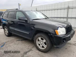 2007 Jeep Grand Cherokee Laredo with VIN 1J8GR48K77C569155, listed as a Copart auction lot 66904414 with 171,064 mi miles and Salvage Title. Bid and sale history available at carsss.com. Image 4.