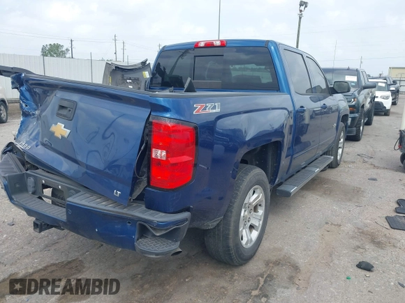 2017 Chevrolet Silverado 1500 LT with VIN 3GCUKREC8HG462719, listed as a IAAI auction lot 41940176 with 380,676 mi miles and . Bid and sale history available at DreamBid. Image 4.