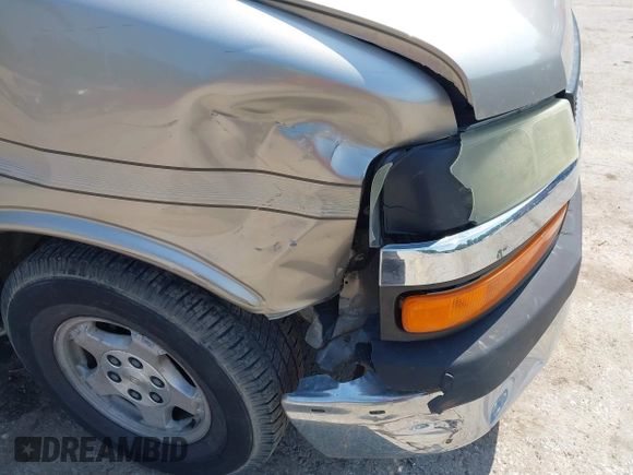 2004 Chevrolet Express Passenger with VIN 1GBFG15T041157045, listed as a IAAI auction lot 42486752 with 319,752 mi miles and . Bid and sale history available at DreamBid. Image 12.