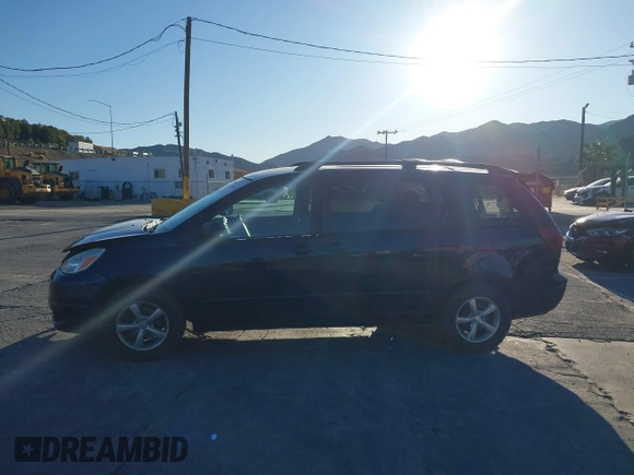 2005 Toyota Sienna CE with VIN 5TDZA23C25S321595, listed as a IAAI auction lot 41666085 with 199,810 mi miles. Bid and sale history available at carsss.com. Image 14.