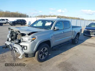 2018 Toyota Tacoma SR5 with VIN 3TMDZ5BN3JM054548, listed as a IAAI auction lot 42038480 with 122,242 mi miles and . Bid and sale history available at DreamBid. Image 17.