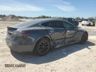 2017 Tesla Model S 100D with VIN 5YJSA1E20HF194600, listed as a Copart auction lot 49068495 with 52,023 mi miles and Salvage title. Bid and sale history available at DreamBid. Image 3.