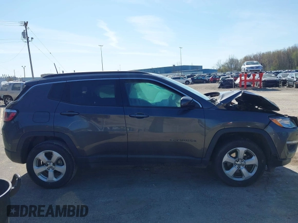2018 Jeep Compass Altitude with VIN 3C4NJDBB6JT239565, listed as a IAAI auction lot 42219401 with 85,013 mi miles and . Bid and sale history available at DreamBid. Image 13.
