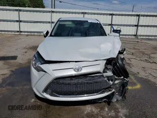 2019 Toyota Yaris L z VIN 3MYDLBYV7KY519027, wystawiony jako Copart lot #57104345 z przebiegiem Nie podano mil oraz Szkoda całkowita • Salvage title. Historia ofert i sprzedaży dostępna na DreamBid. Obrazek 5.