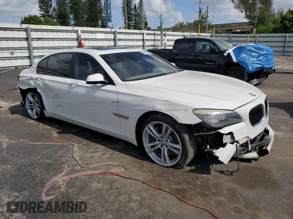 2012 BMW 7 Series 750Li z VIN WBAKB8C50CC964123, wystawiony jako Copart lot #60212005 z przebiegiem 75 979 mil mil oraz Szkoda całkowita • Salvage title. Historia ofert i sprzedaży dostępna na DreamBid. Obrazek 4.