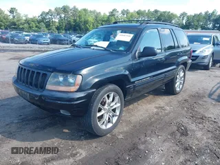 2002 Jeep Grand Cherokee Limited with VIN 1J4GW58N02C176004, listed as a IAAI auction lot 42687339 with 171,545 mi miles and . Bid and sale history available at DreamBid. Image 2.