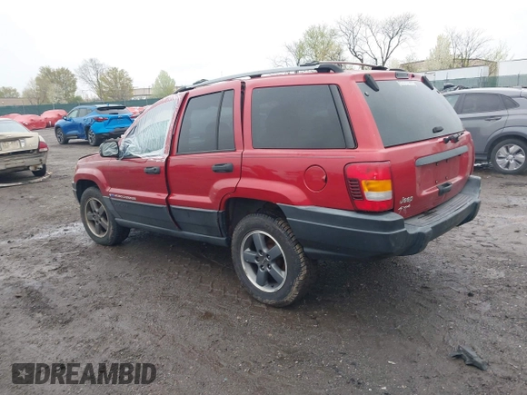 2004 Jeep Grand Cherokee Laredo with VIN 1J4GW48S94C151816, listed as a IAAI auction lot 41983332 with 151,227 mi miles. Bid and sale history available at carsss.com. Image 3.