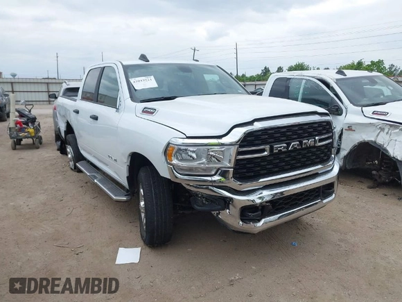 2024 Ram 2500 Big Horn with VIN 3C6UR5DJ1RG249902, listed as a IAAI auction lot 42043924 with 21,560 mi miles. Bid and sale history available at carsss.com. Image 1.