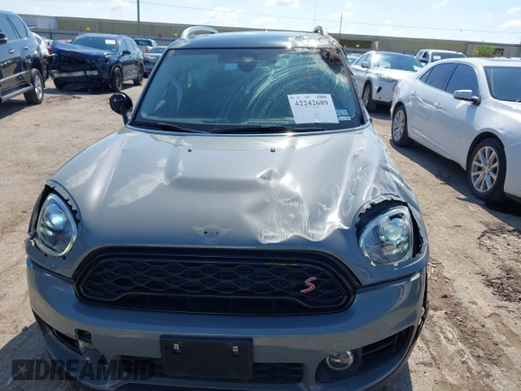 2020 MINI Countryman Cooper S with VIN WMZYW7C05L3M07661, listed as a IAAI auction lot 42242689 with 45,602 mi miles and . Bid and sale history available at DreamBid. Image 12.