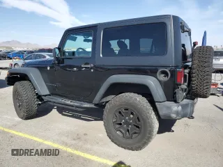 2017 Jeep Wrangler Sport with VIN 1C4AJWAGXHL715362, listed as a Copart auction lot 51262305 with 62,297 mi miles and Salvage Title. Bid and sale history available at DreamBid. Image 2.