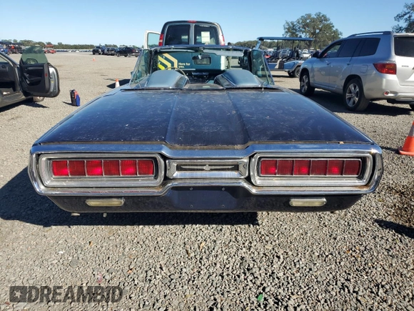 1965 Ford Thunderbird with VIN 5Y85Z115781, listed as a Copart auction lot 82289124 with 75,677 mi miles and Salvage Title. Bid and sale history available at DreamBid. Image 6.