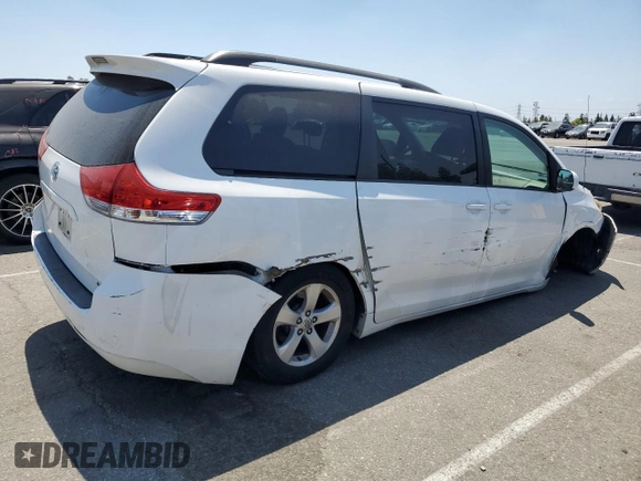 2014 Toyota Sienna LE AAS with VIN 5TDKK3DC8ES442280, listed as a Copart auction lot 59374985 with 207,563 mi miles and Salvage title. Bid and sale history available at DreamBid. Image 3.