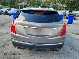 2019 Cadillac XT5 Luxury FWD z VIN 1GYKNCRS3KZ139886, wystawiony jako Copart lot #62167155 z przebiegiem 96 251 mil mil oraz Szkoda całkowita • Salvage title. Historia ofert i sprzedaży dostępna na DreamBid. Obrazek 6.