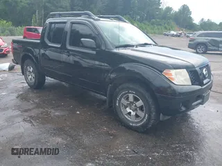 2011 Nissan Frontier Pro-4X with VIN 1N6AD0EV1BC407952, listed as a IAAI auction lot 42607754 with 188,467 mi miles and . Bid and sale history available at DreamBid. Image 1.