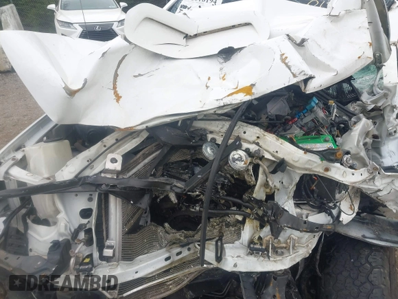 2013 Toyota Tacoma z VIN 5TFMU4FN9DX019465, wystawiony jako IAAI lot #42010194 z przebiegiem 115 812 mil mil oraz . Historia ofert i sprzedaży dostępna na DreamBid. Obrazek 10.