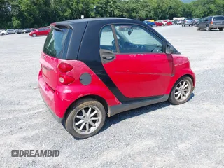 2010 Smart fortwo Pure with VIN WMEEJ3BA0AK373668, listed as a IAAI auction lot 42675428 with 139,616 mi miles and . Bid and sale history available at DreamBid. Image 4.