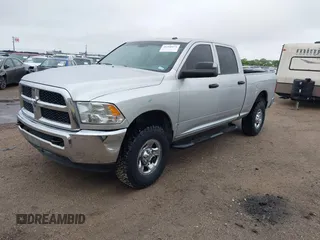2013 Ram 2500 Tradesman z VIN 3C6TR5CT1DG562584, wystawiony jako IAAI lot #41958471 z przebiegiem 185 426 mil mil oraz . Historia ofert i sprzedaży dostępna na DreamBid. Obrazek 2.